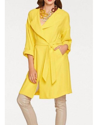 Ryškiai geltonas paltukas