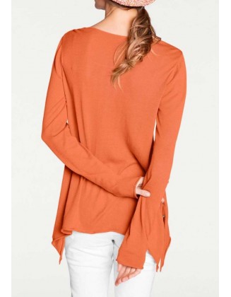 Oranžinis laisvo stiliaus megztinis